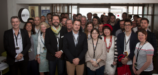 Le Premier ministre entouré des professionnels de l'audiovisuel et participants au marché du film ainsi que de Guy Daleiden, directeur du Film Fund Luxembourg et de son équipe