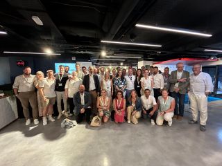 Photo de groupe des participants dans la Maison du Luxembourg